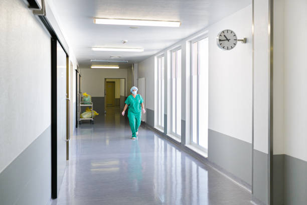 istock Surgeon is walking down the hospital corridor 1289093747