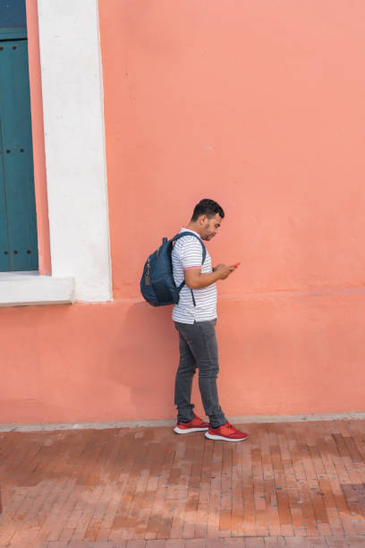 istock Latino man with the smartphone making a video call 1289096557