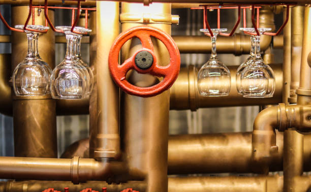 contador de barras no estilo de steampunk com tubos banhados a ouro e uma ventilação vermelha. - gold plated - fotografias e filmes do acervo