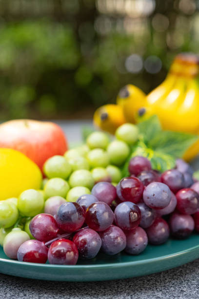 side view artificial fruits in the outdoor vertical composition