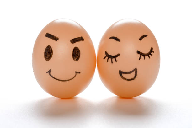 istock egg faces of lovely couple on white with clipping path 1289103295