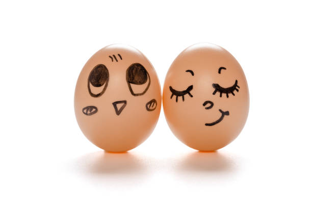 istock egg faces of lovely couple on white with clipping path 1289103321