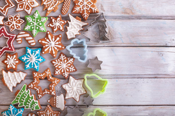 istock Christmas cookies on white wooden table 1289104392