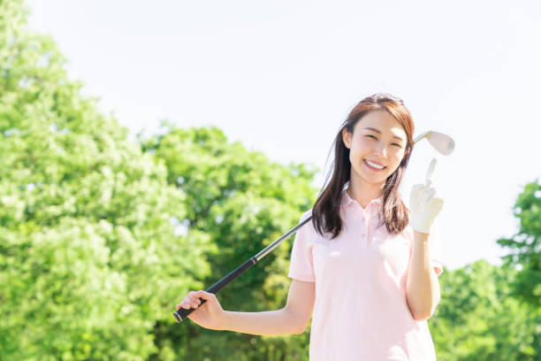 istock asian woman who golfs 1289105863