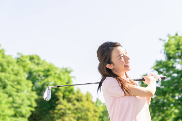 istock asian woman who golfs 1289106025