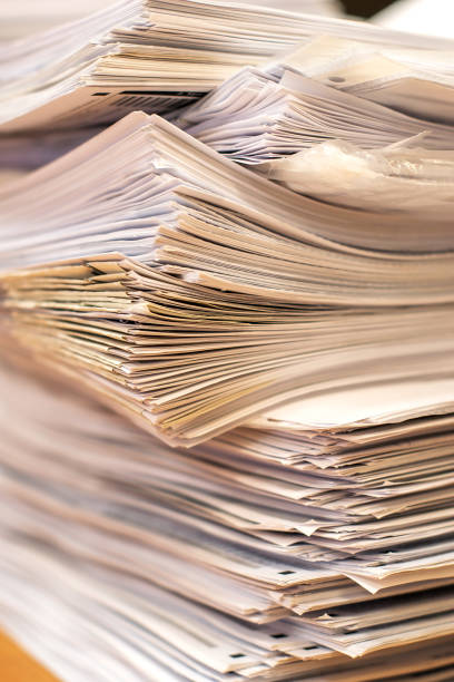 istock pile of paper documents in the office 1289112293