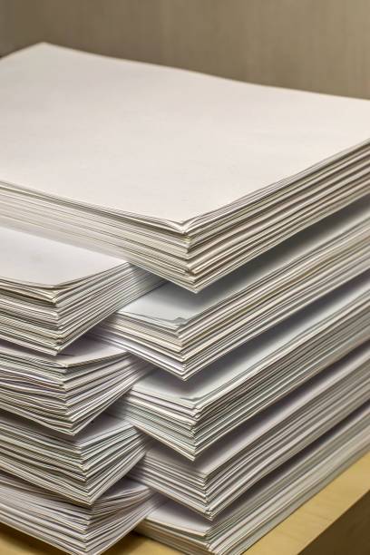istock pile of paper documents in the office 1289112307