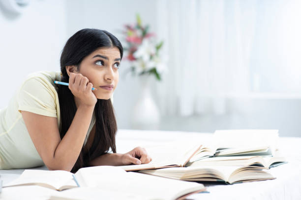 istock Young woman studying - stock photo 1289113923