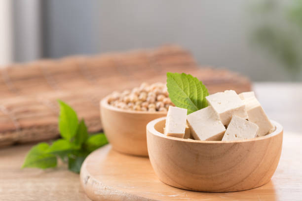 istock Cube tofu and soybean seeds in a bowl 1289115446