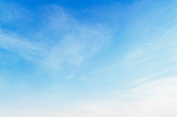 istock blue sky with white cloud and sunshine 1289119543