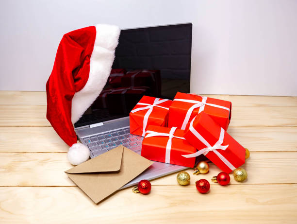 istock Using credit card at home lockdown. Gift boxes, Xmas presents. 1289120400