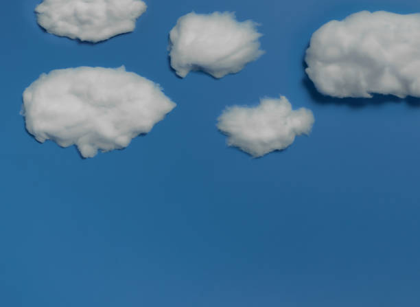 istock White cotton clouds on sky blue background,Minimal concept,Space for text 1289121397