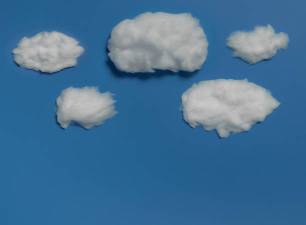 istock White cotton clouds on sky blue background,Minimal concept,Space for text 1289121408