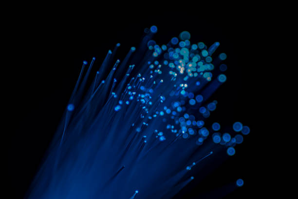 istock Close up of abstract background fiber optics,internet communication concept 1289121449