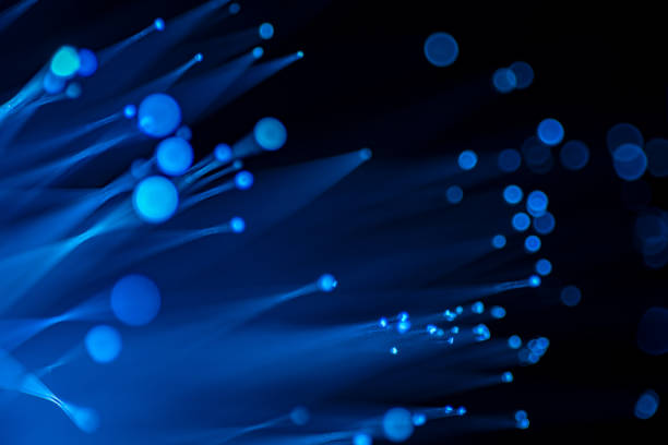 istock Close up of abstract background fiber optics,internet communication concept 1289121464