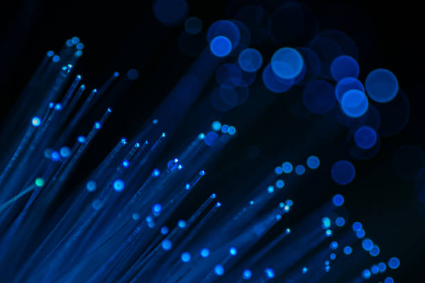 istock Close up of abstract background fiber optics,internet communication concept 1289121468