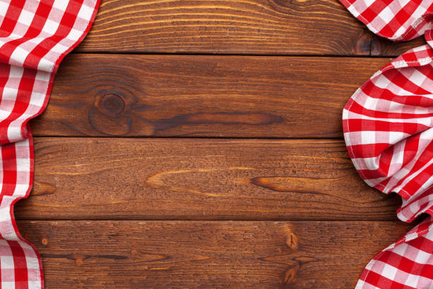 checkered tablecloth on wooden table