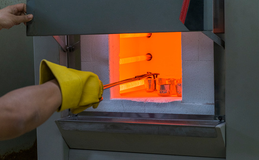 Testing the properties of high-temperature objects with a heated furnace in a laboratory.
