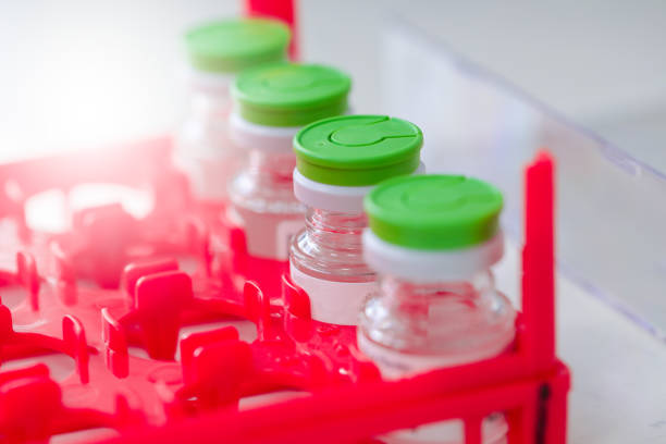 istock Lab bottle vaccine on a dry ice storage. 1289135051