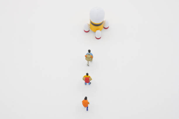 istock Travelers lining up to go on a space trip with a rocket 1289135218