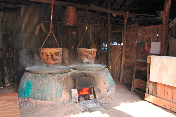 Traditional salt making by boiling underground salt water from natural rocksalt pond,Nan province, Thailand. stock photo