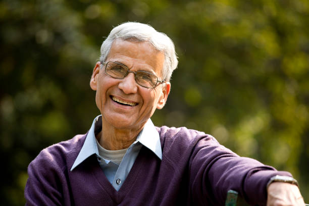istock Happy senior man at park 1289138832