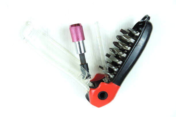 istock A magnetic quick release bit holder with various screw driving bits and a countersink. white background. 1289139129