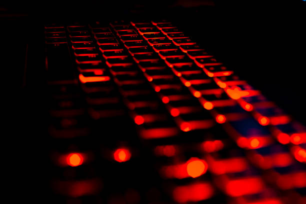 English language laptop keyboard with red light
