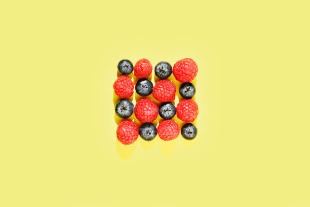 istock Fresh blueberries and raspberries studio shot 1289141039