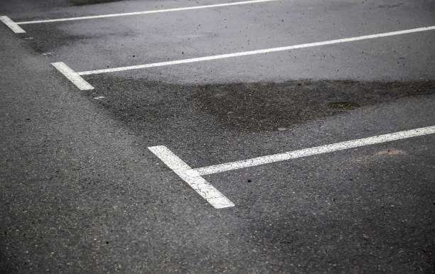 istock Signs to park in a parking lot 1289142675