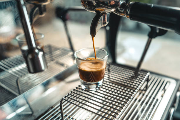 istock Barista Making Americano Coffee At Cafe,Coffee from the machine 1289146349