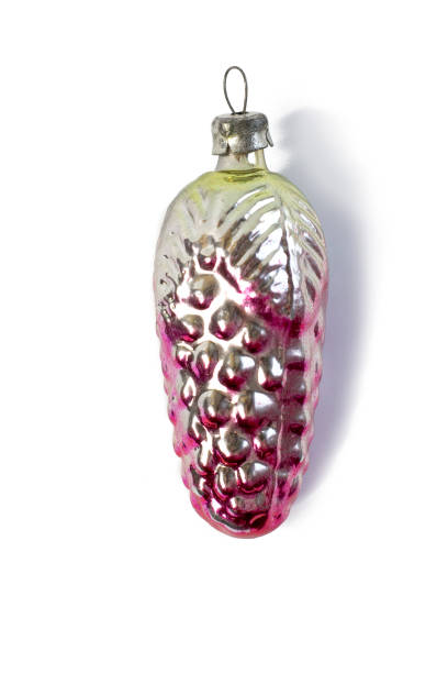 istock Old soviet decoration on the Christmas tree, glass toy pine cone close up isolated on white background 1289147072