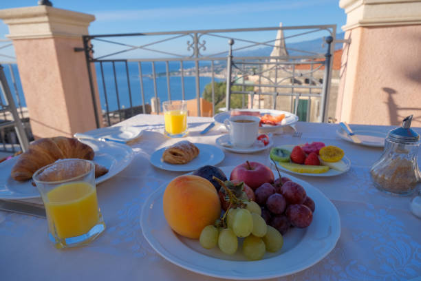 istock Taormina Sicily Italy breakfast table with a rooftop view over Taormina 1289147220