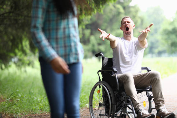 istock Woman break off relations with disabled man and leave. 1289147248