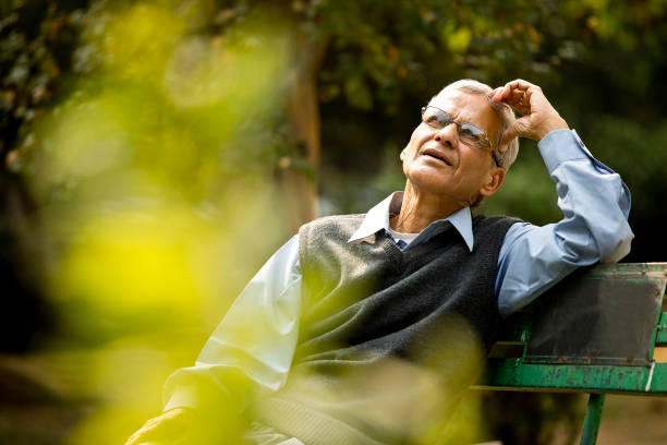 istock Thoughtful senior man at park 1289147478