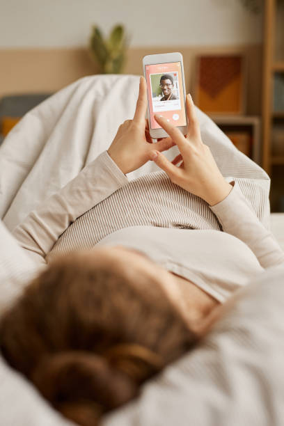 istock Woman looking at photo 1289148297
