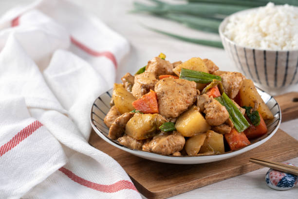 istock Homemade delicious cubed chicken with braised potato chunks. 1289148486
