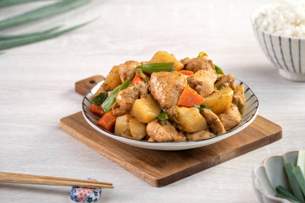 istock Homemade delicious cubed chicken with braised potato chunks. 1289148505