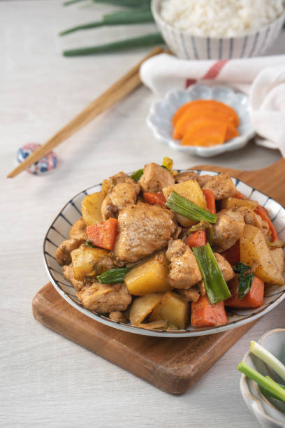 istock Homemade delicious cubed chicken with braised potato chunks. 1289148516