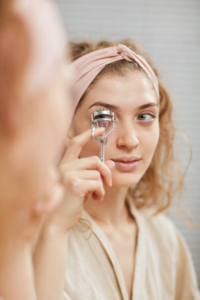 istock Taking care of her eyelashes 1289148629