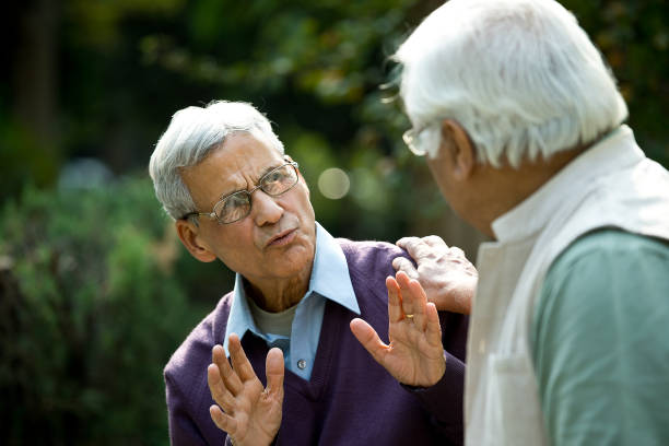 istock Two senior men discussing at park 1289149099