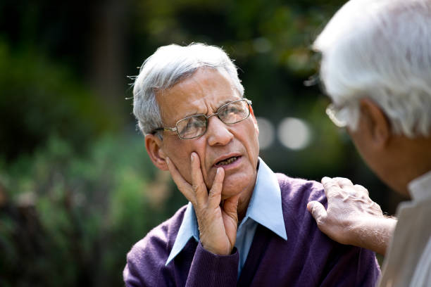 istock Two senior men discussing at park 1289149719