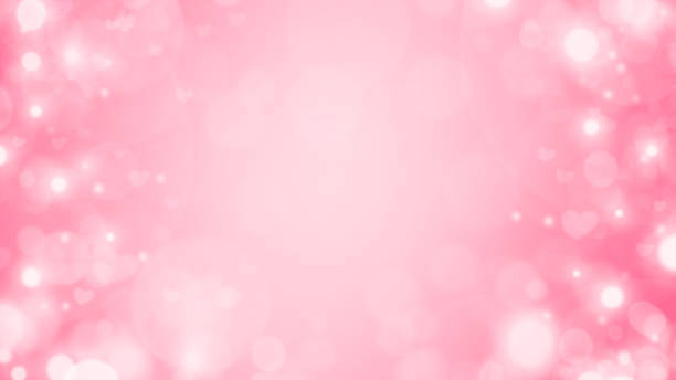 istock Valentines day pink bokeh background with soft hearts and circles 1289150383