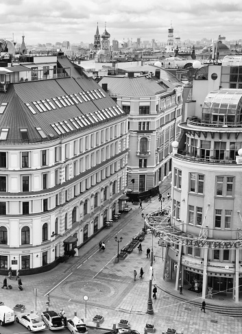 Paris, France - September 10, 2023 : Old black and white photo of Montparnasse tower and the rooftops of Paris, France