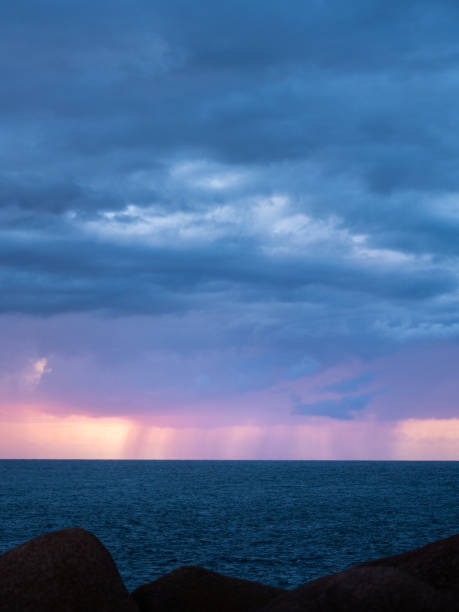 istock Clouds and rain over the atlantic sea 1289158330