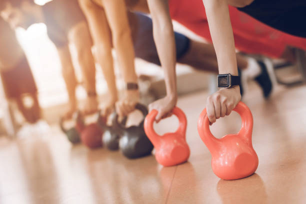 istock Athletes do exercises in the modern gym 1289159545