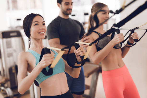 istock Athletes do exercises in a modern gym with modern simulators. 1289159657