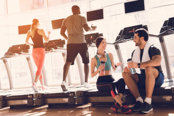 istock Athletes engage in modern treadmills in the bright gym 1289159758
