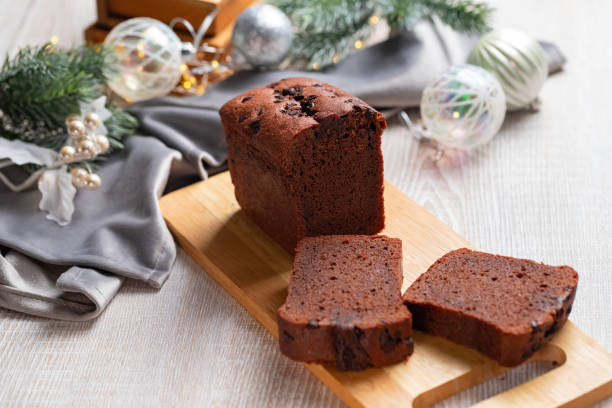 istock Slices of chocolate cake on gray Christmas table. 1289159846