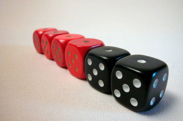 istock red and black dice showing the number one 1289160807